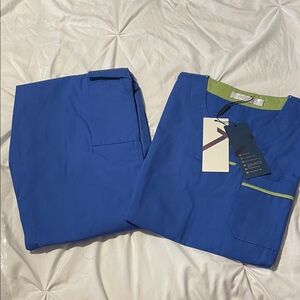 Three full sets of Woman’s cordz scrubs price is for all 3